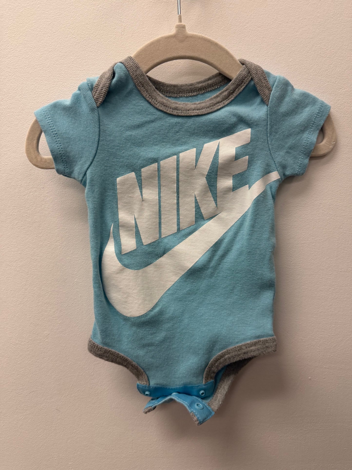 NIKE BLUE ONESIE SIZE 0-6M