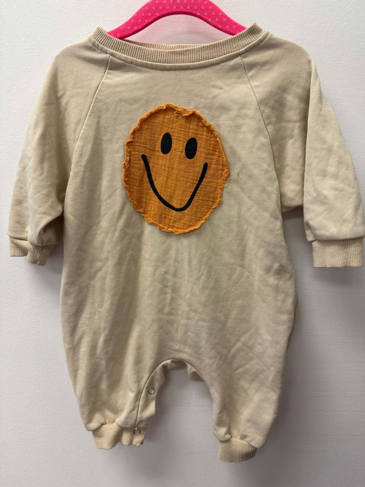 SMILEY FACE OVERSIZED ONE PIECE SIZE 6-12M