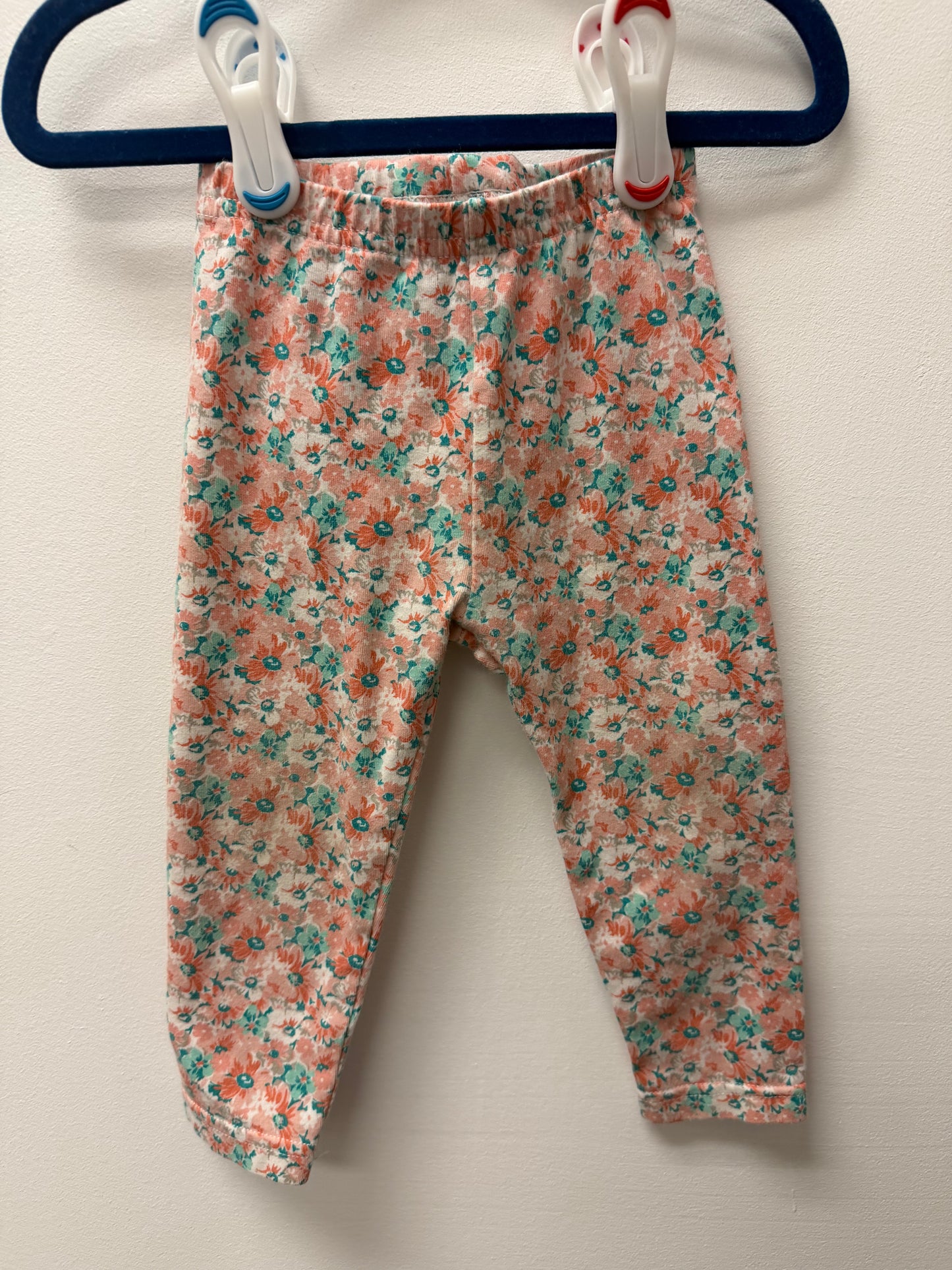 CARTERS PEACH COLORED FLORAL LEGGINGS SIZE 12M