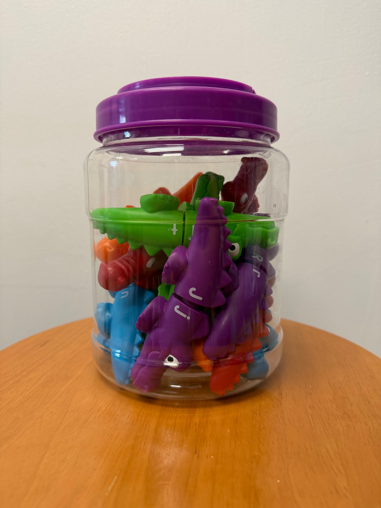 BIN OF ALPHABET TOYS