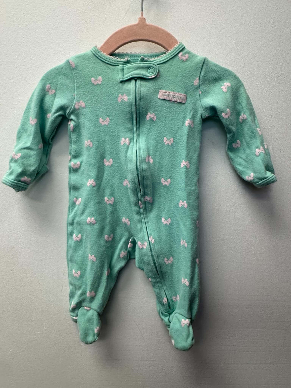 CARTERS BOW SLEEPER SIZE NEWBORN
