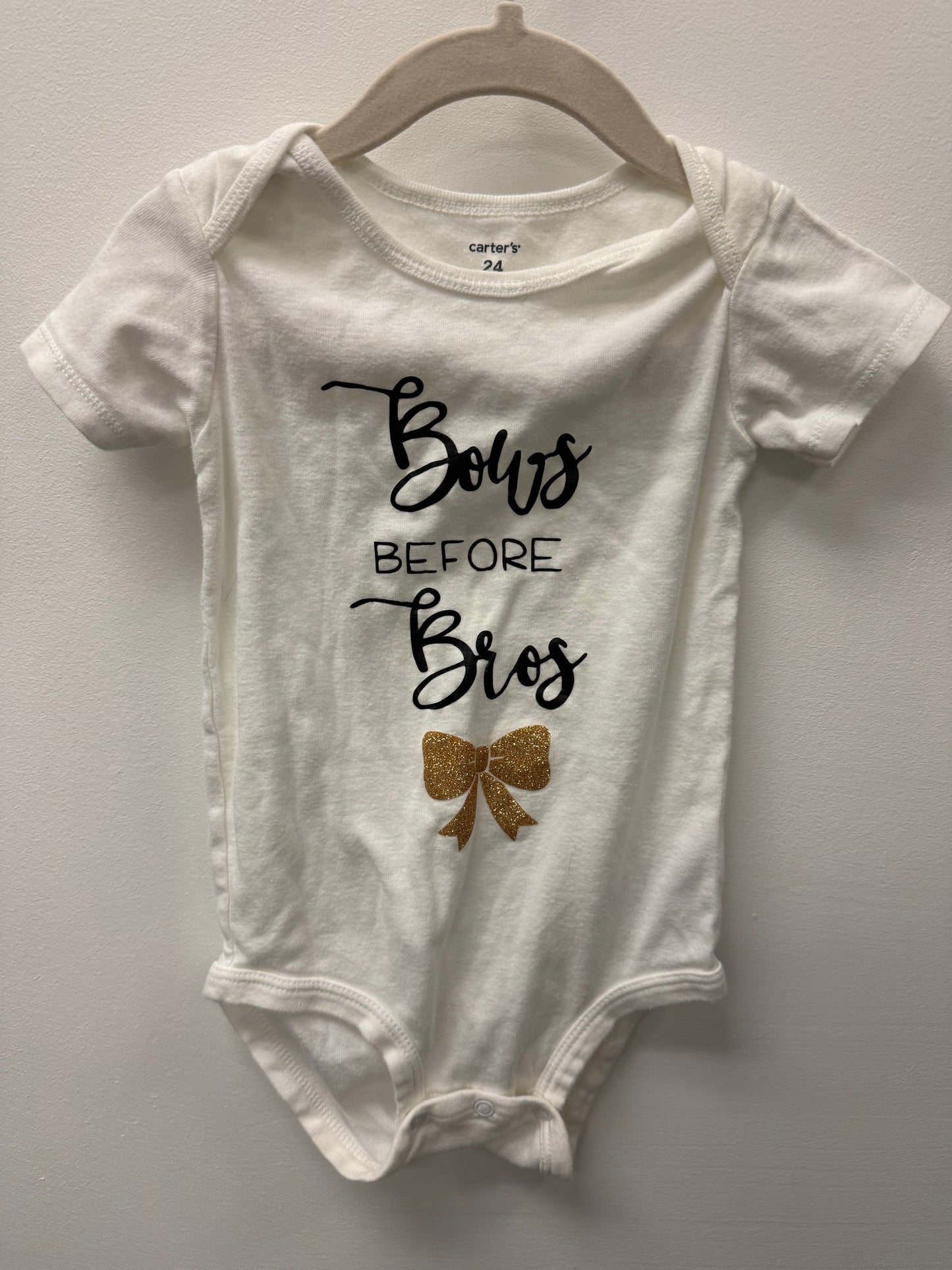 CARTERS BOW ONESIE SIZE 24M