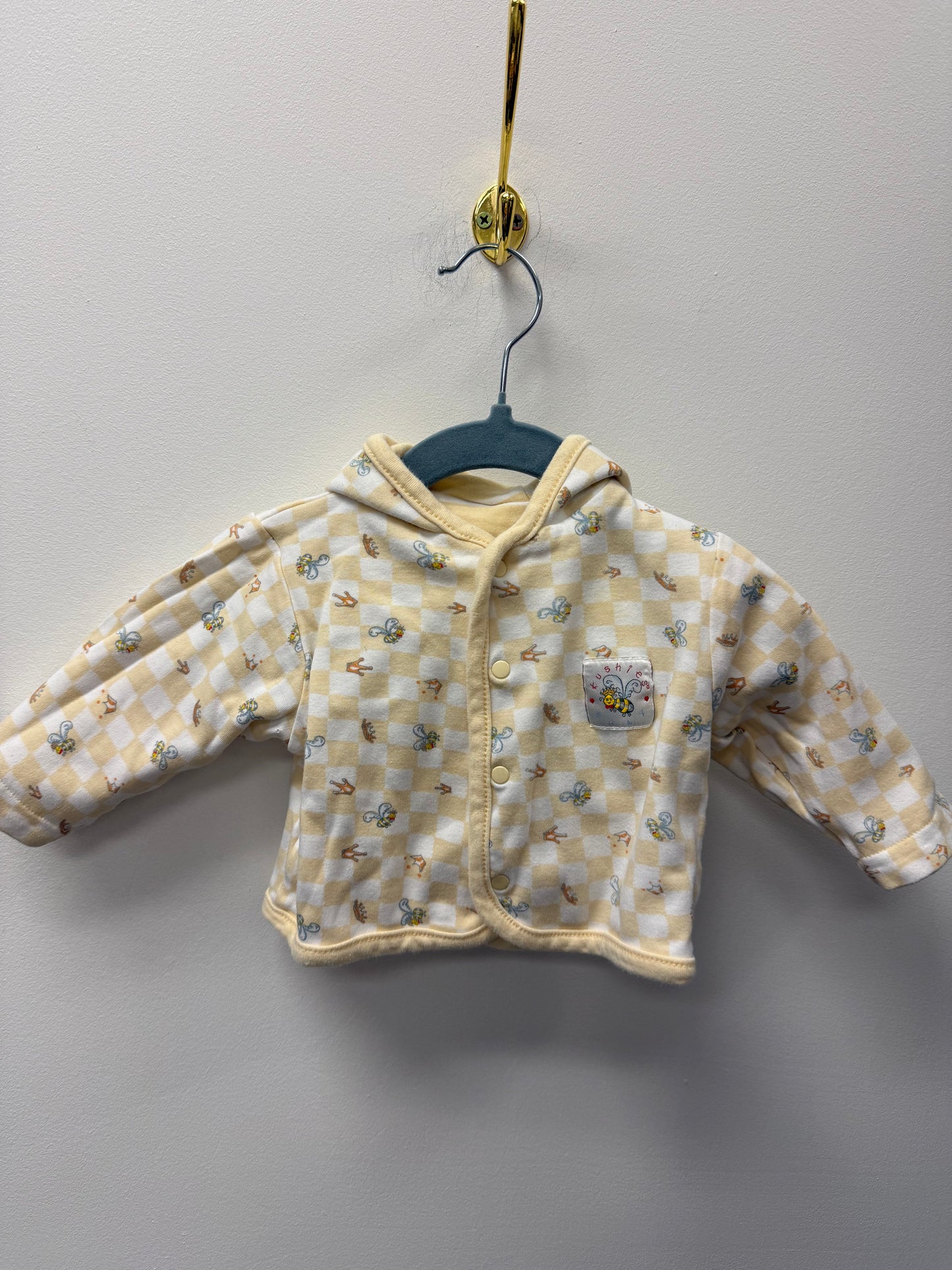 KUSHIES CHECKERED REVERISBLE  SWEATER SIZE NEWBORN