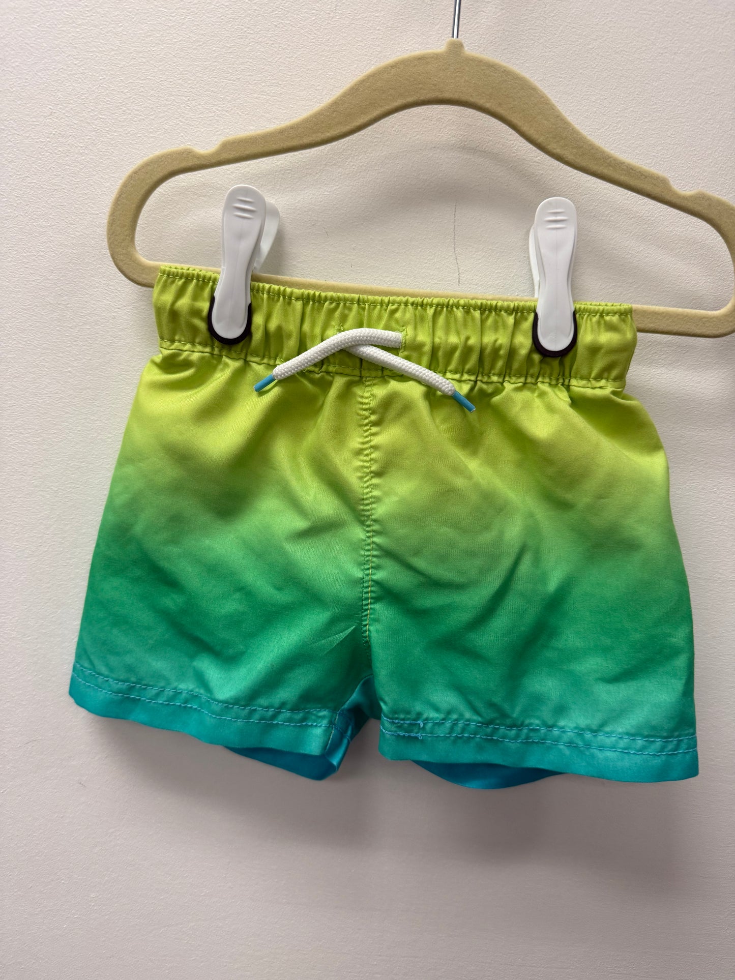 OLD NAVY GREEN SWIM SHORTS SIZE 12-18M