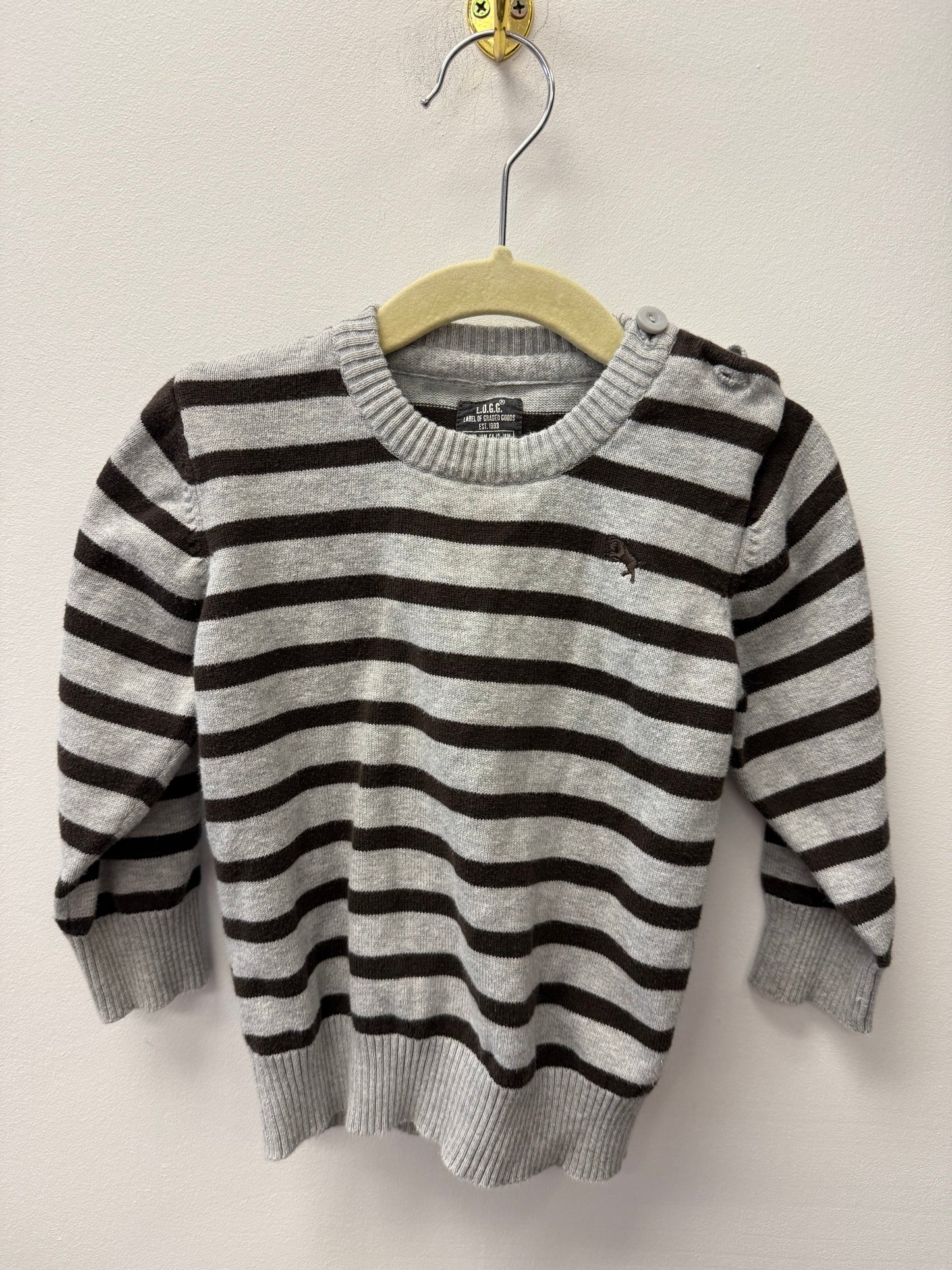 LABEL OF GRADED GOODS SWEATER SIZE 12-18M