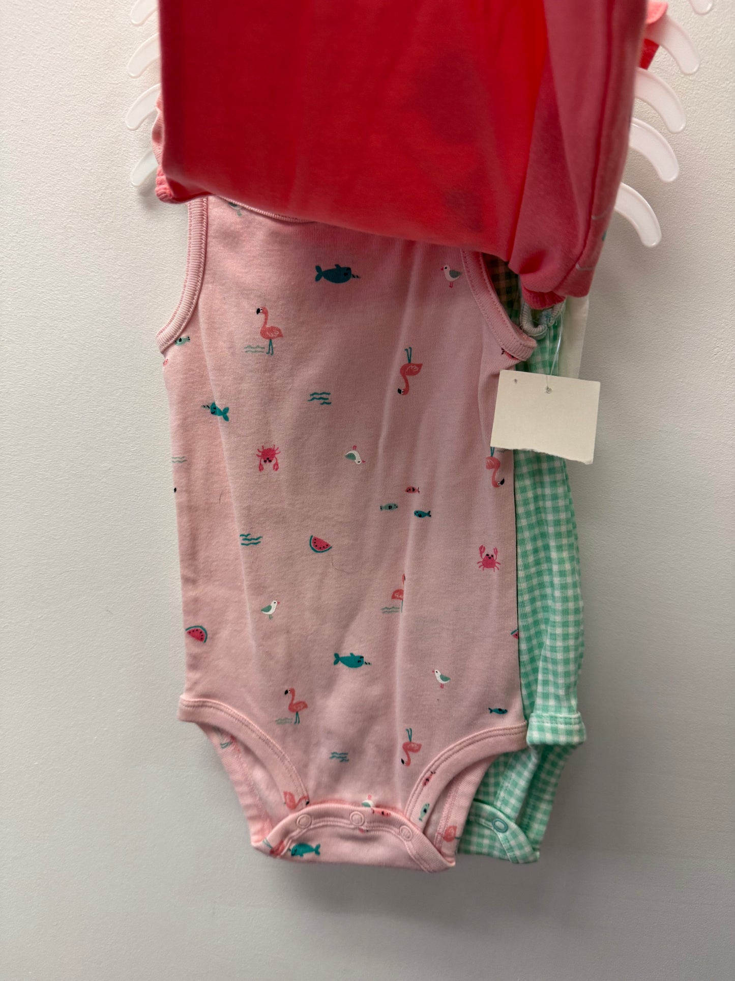NEW 4 PACK OF CARTERS ONESIES SIZE 12M
