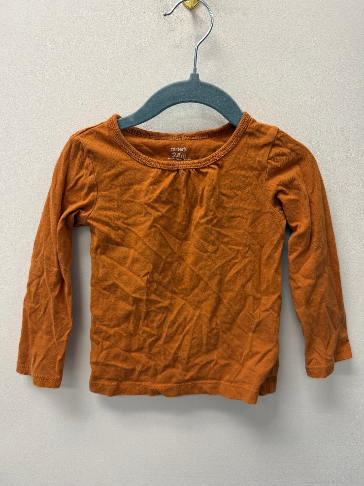 CARTERS BURNT ORANGE LONG SLEEVE SIZE 24M