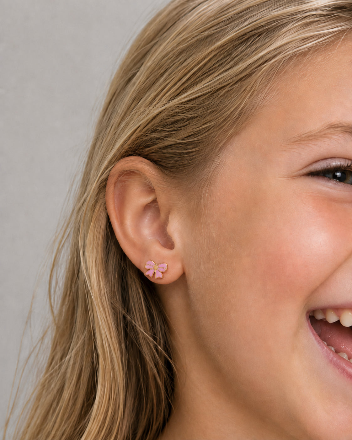 LITTLE PINK BOW STUDS