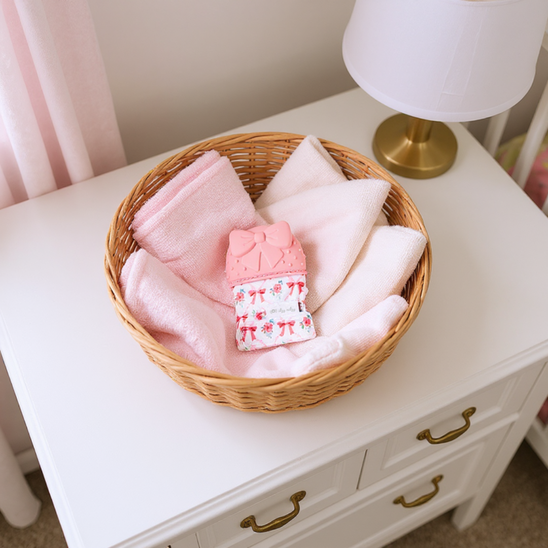 Itzy Mitt™ Silicone Bow Teething Mitt