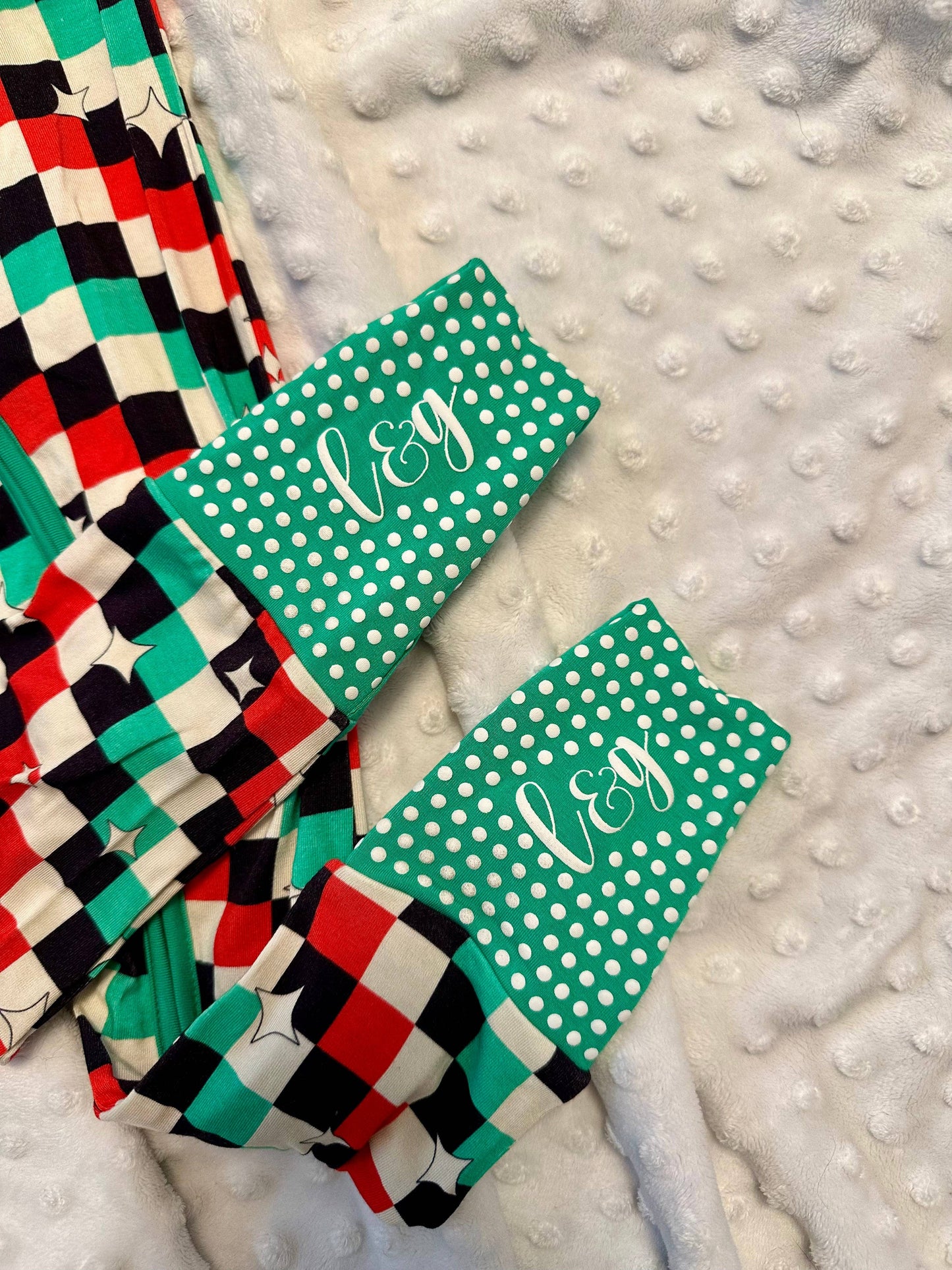 Love & Grace Check the halls zip romper