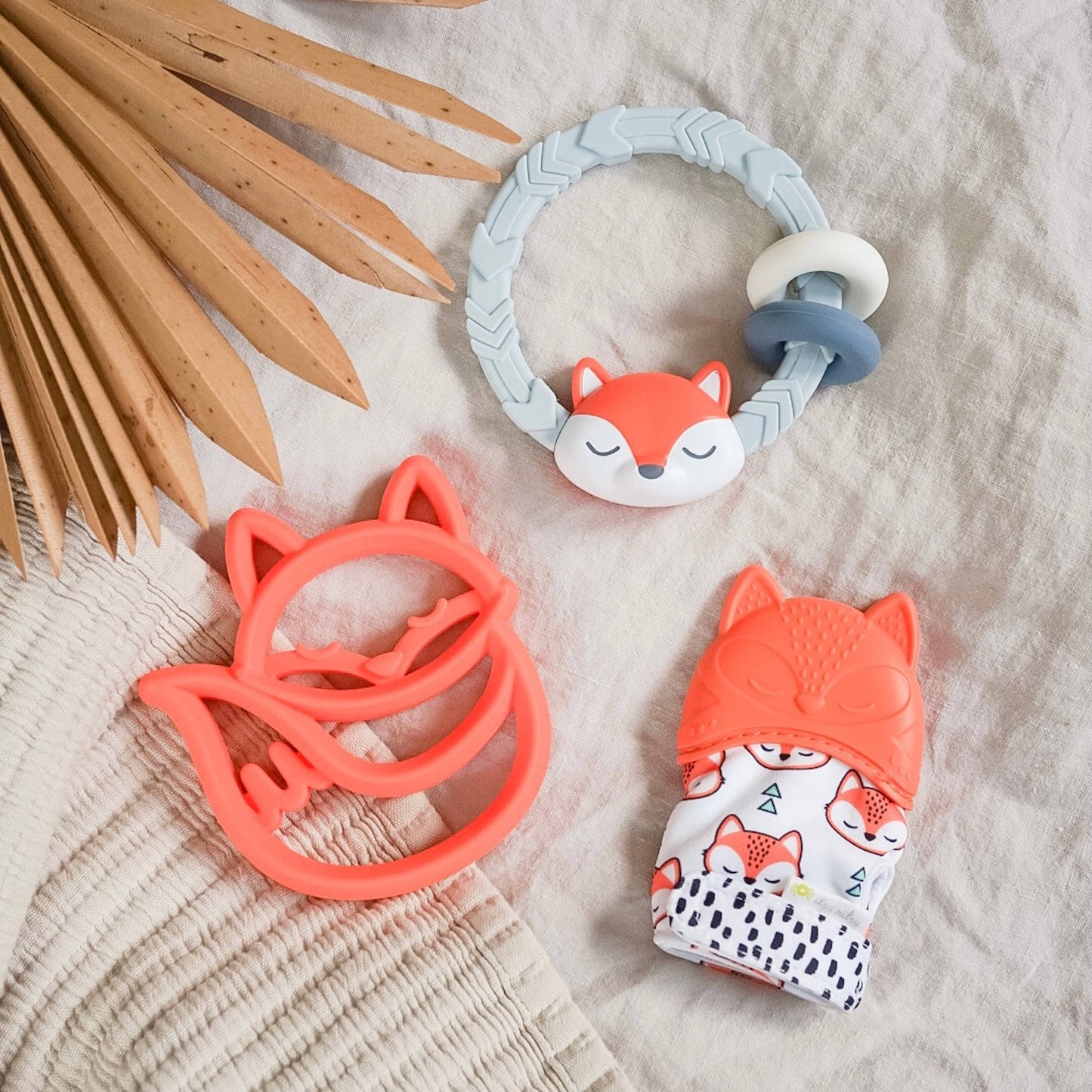 Itzy Mitt™ Silicone Bow Teething Mitt